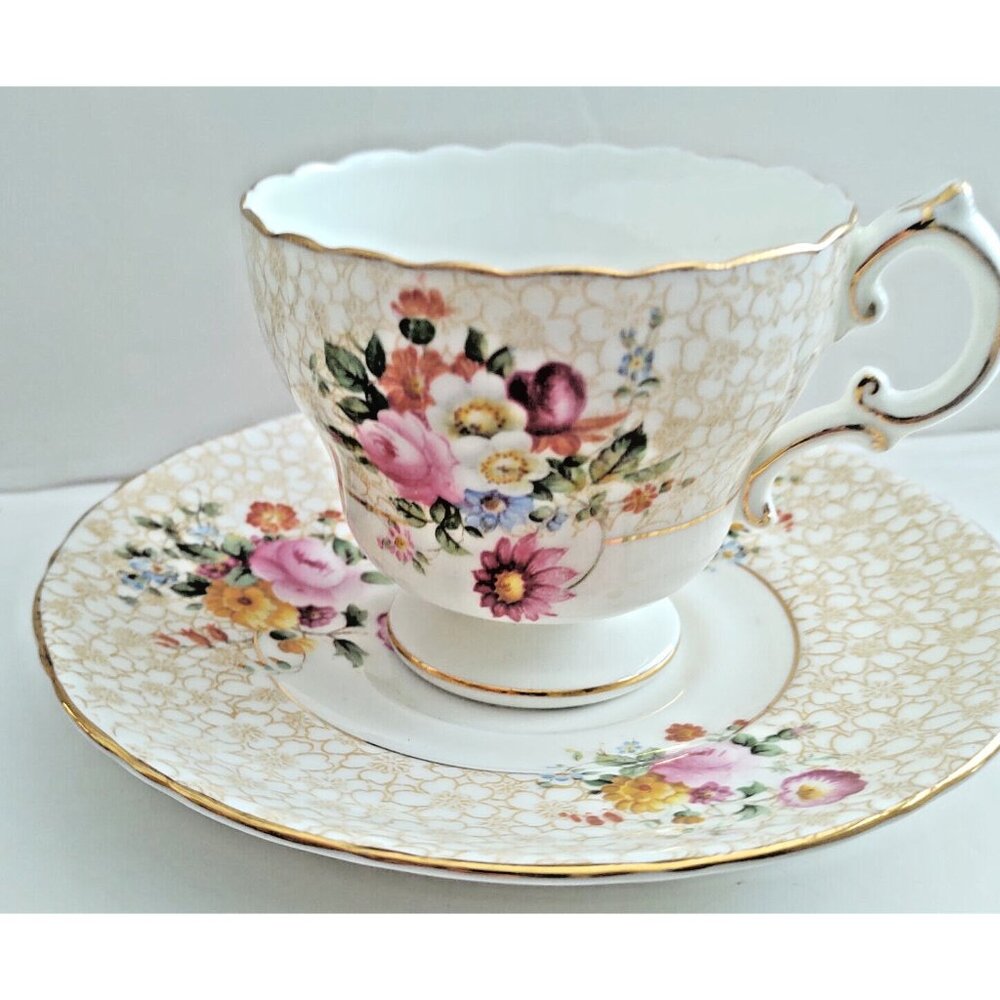 CAULDON tea cup and saucer floral painted rose chintz teacup England 1940s
